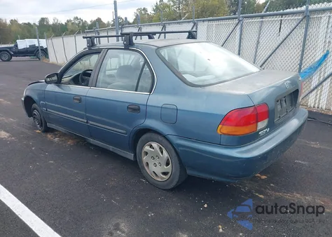 1997 Honda Civic Lx from USA, damaged, VIN 1HGEJ6673VL013634